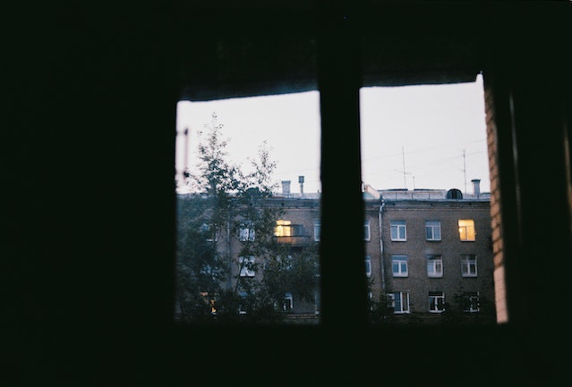 looking outside an apartment window
