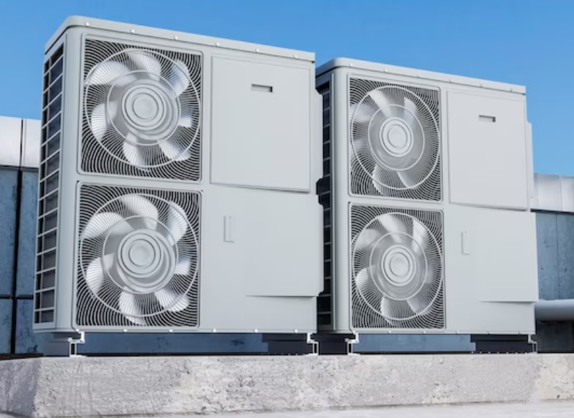 four heat pumps on a rooftop